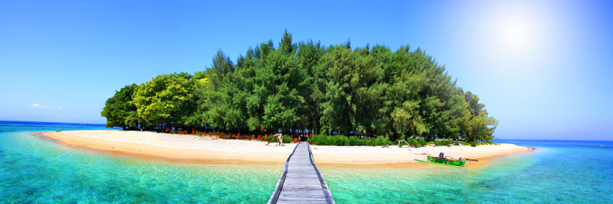 photograph of tropical island in the middle of the ocean